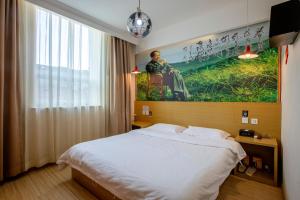 Happy Dragon Alley Hotel-In the city center close to the subway&free coffe laundry Fluent English speaking,Tourist attractions ticket service&food recommendation,Near Tian Anmen Forbiddencity,Near Lama temple,Easy access to the airport客房内的一张或多张床位