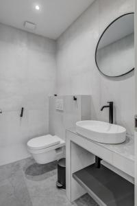 Um banheiro em Lichia Amia Luxury Rooms
