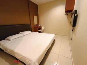 Postel nebo postele na pokoji v ubytování Doris Hotel