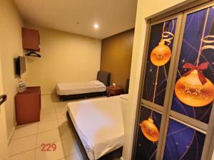 Postel nebo postele na pokoji v ubytování Doris Hotel
