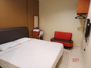 Postel nebo postele na pokoji v ubytování Doris Hotel