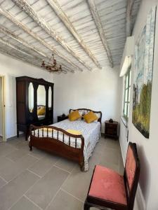 Ένα ή περισσότερα κρεβάτια σε δωμάτιο στο Casa Porta Velha 2 Bed
