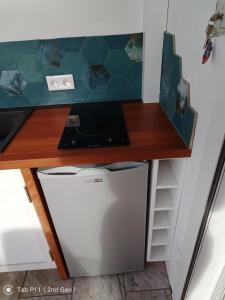 Kuchyň nebo kuchyňský kout v ubytování Studio meublé Bois de nèfles Saint Paul