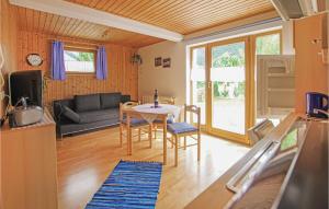Televízia a/alebo spoločenská miestnosť v ubytovaní Ferienwohnung Mit Bergblick