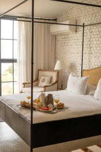 En eller flere senge i et værelse på Casa Del Val- Villa Maria