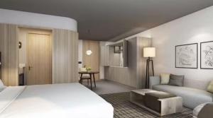 a rendering of a bedroom with a bed and a couch at Homewood Suites By Hilton Nashville Downtown The Gulch in Nashville