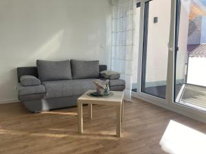 Χώρος καθιστικού στο Ferienwohnung im Weingut Jens Griebel