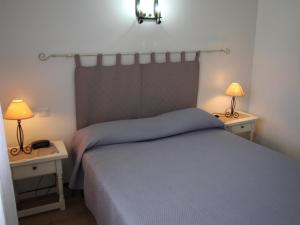 Posteľ alebo postele v izbe v ubytovaní BRAMANT 5 - Primera planta con terraza, vistas al mar y parking. - ES-228-77