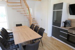 Η κουζίνα ή μικρή κουζίνα στο Ferienhaus Ostseetraum - ABC427 +12 φωτογραφίες