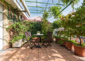 O grădină în afara Central Room con terrazzo e bagno privato, clima