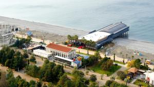 an aerial view of a building next to the beach at Lux Apart Hotel 555 in Batumi