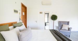 Posteľ alebo postele v izbe v ubytovaní Hotel Catalina