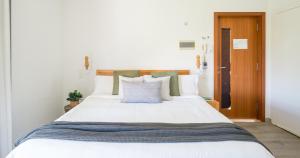Posteľ alebo postele v izbe v ubytovaní Hotel Catalina