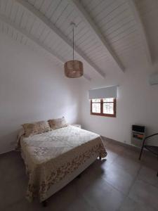 Postel nebo postele na pokoji v ubytování Casa en Tres Cerritos