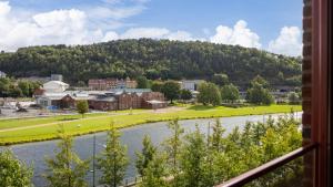 a view from a window of a town with a river at Modern 3bed room sea view apartment @ Oslo Barcode in Oslo