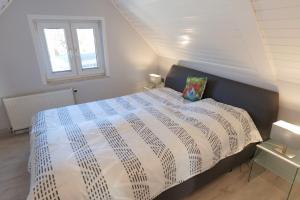 En eller flere senge i et værelse på Jan Brügemann - 2 Etage - ABC437 + 7 billeder