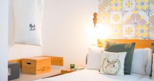 Posteľ alebo postele v izbe v ubytovaní Hotel Catalina