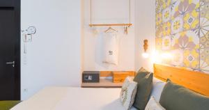 Posteľ alebo postele v izbe v ubytovaní Hotel Catalina