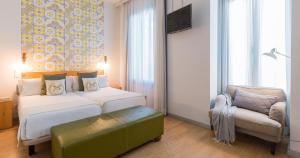 Posteľ alebo postele v izbe v ubytovaní Hotel Catalina