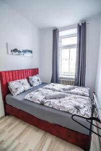 Letto o letti in una camera di Cozy Rooms in Pragerstrasse