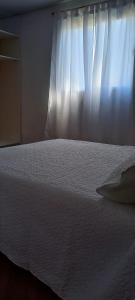 Cama ou camas em um quarto em Complejo Mallorca San Rafael