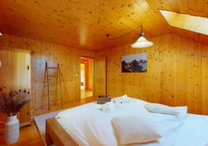 Krevet ili kreveti u jedinici u okviru objekta Chalet authentique avec magnifique vue