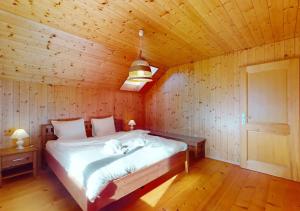 Krevet ili kreveti u jedinici u okviru objekta Chalet authentique avec magnifique vue