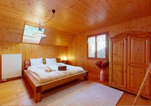 Krevet ili kreveti u jedinici u okviru objekta Chalet authentique avec magnifique vue