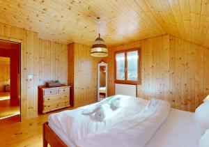 Krevet ili kreveti u jedinici u okviru objekta Chalet authentique avec magnifique vue
