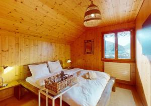 Krevet ili kreveti u jedinici u okviru objekta Chalet authentique avec magnifique vue