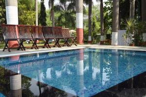 Fotografie z fotogalerie ubytování The Whispering Palms Resort v destinaci Bhópál