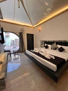 Fotografie z fotogalerie ubytování The Whispering Palms Resort v destinaci Bhópál
