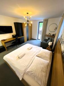 Posteľ alebo postele v izbe v ubytovaní Apartmán u Ričiho-Snowland Valčianska dolina