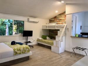 Casa de las Flores tropical客房内的一张或多张床位