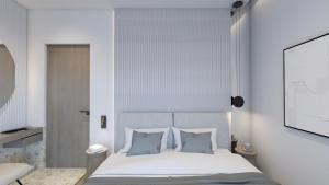 Posteľ alebo postele v izbe v ubytovaní Anemolia Parga Suites