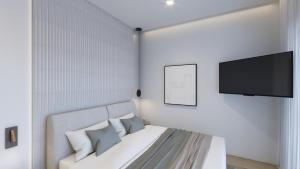 Posteľ alebo postele v izbe v ubytovaní Anemolia Parga Suites