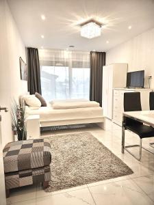 Ένα ή περισσότερα κρεβάτια σε δωμάτιο στο Schneider Apartments