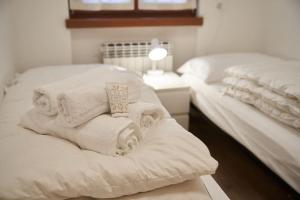 Postel nebo postele na pokoji v ubytování Appartamento a Caderzone Terme