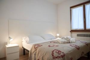Postel nebo postele na pokoji v ubytování Appartamento a Caderzone Terme