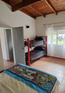 Postel nebo postele na pokoji v ubytování La Casita De Atras