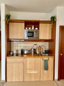 A kitchen or kitchenette at Apartment KIMO - stunning view of High Tatras