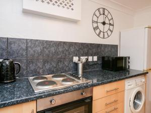 A cozinha ou kitchenette de Time and Tide