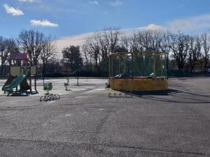 an empty playground in a parking lot at Mobil Home 4Pers VO in Talmont