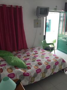 Ліжко або ліжка в номері Casinhas de Alfenim