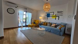 Część wypoczynkowa w obiekcie Apartment Bluemare with shared pool