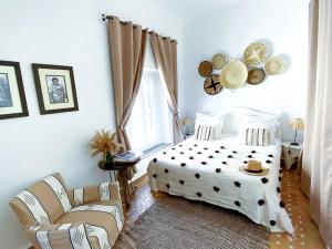 En eller flere senge i et værelse på Riad Lyon-Mogador