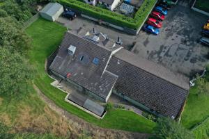 an overhead view of a house with a roof at Auld Mill House Hotel in Dunfermline