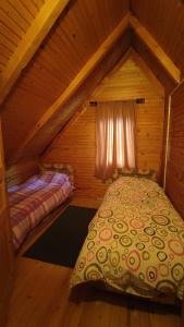 A bed or beds in a room at Holiday Home Snow Queen