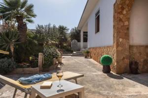 A patio or other outdoor area at Il Golfo di Cofano