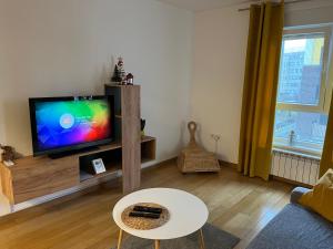 TV a/nebo společenská místnost v ubytování Yellow Gate